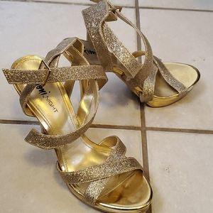 Gold glitter heels with matching purse (not shown)
